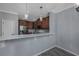 Modern kitchen with dark brown cabinets and white countertops at 4200 Coquina Harbour Dr. # H3, Little River, SC 29566