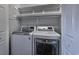 Convenient laundry room with LG washer and dryer, and overhead shelving at 4200 Coquina Harbour Dr. # H3, Little River, SC 29566