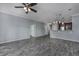Open living area with wood-look tile floors and kitchen views at 4200 Coquina Harbour Dr. # H3, Little River, SC 29566