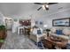 Open living room showcasing a comfortable seating area and kitchen views at 4200 Coquina Harbour Dr. # H3, Little River, SC 29566