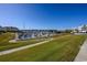 Stunning view of the marina with many boats and clear blue skies at 4200 Coquina Harbour Dr. # H3, Little River, SC 29566