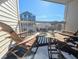 This private balcony offers a peaceful retreat with comfortable seating and stunning views at 4305 N Ocean Blvd. # 205, North Myrtle Beach, SC 29582
