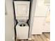 Convenient stackable washer and dryer located near the kitchen, making laundry a breeze at 4305 N Ocean Blvd. # 205, North Myrtle Beach, SC 29582