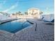 Inviting community pool with clear blue water, surrounded by lounge chairs for relaxation at 4305 N Ocean Blvd. # 205, North Myrtle Beach, SC 29582