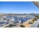 Expansive marina view showcasing multiple boats, docks, and distant buildings at 4609 Lightkeepers Way # 11J, Little River, SC 29566