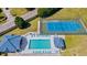 Aerial view of the community pool, tennis court and shuffle board in this charming community at 4609 Lightkeepers Way # 11J, Little River, SC 29566