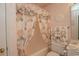 Bathroom with seashell-themed shower curtain at 4625 Lightkeepers Way # L, Little River, SC 29566