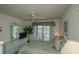 Main bedroom with water views and a ceiling fan at 4625 Lightkeepers Way # L, Little River, SC 29566