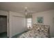 Bright bedroom with double closet and floral bedding at 4625 Lightkeepers Way # L, Little River, SC 29566