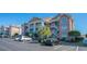 Attractive condo building with ample parking and landscaping at 4625 Lightkeepers Way # L, Little River, SC 29566