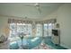 Living room boasts water views and a ceiling fan at 4625 Lightkeepers Way # L, Little River, SC 29566