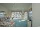 Living room with water views, ceiling fan and sofas at 4625 Lightkeepers Way # L, Little River, SC 29566