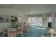 Living room with water views and floral sofas at 4625 Lightkeepers Way # L, Little River, SC 29566