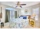 Bedroom with a queen bed and nautical decor at 4629 Lightkeepers Way # 6-I, Little River, SC 29566