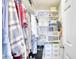 Large walk-in closet with shelving and hanging rods at 4629 Lightkeepers Way # 6-I, Little River, SC 29566