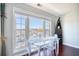 Dining area with glass table and chairs, and stunning water views at 4629 Lightkeepers Way # 6-I, Little River, SC 29566
