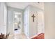 Hallway with hardwood floors, a bathroom and closets at 4629 Lightkeepers Way # 6-I, Little River, SC 29566
