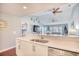 Kitchen with white cabinets, stainless steel appliances, and a peninsula at 4629 Lightkeepers Way # 6-I, Little River, SC 29566