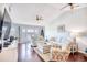 Spacious living room with hardwood floors, vaulted ceilings and water views at 4629 Lightkeepers Way # 6-I, Little River, SC 29566