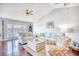 Spacious living area with hardwood floors and water views at 4629 Lightkeepers Way # 6-I, Little River, SC 29566