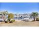 Marina view with palm trees and manicured landscaping at 4629 Lightkeepers Way # 6-I, Little River, SC 29566