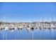 Calm water reflects the boats and buildings in the marina at 4629 Lightkeepers Way # 6-I, Little River, SC 29566