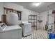 Laundry room with washer, dryer, and ample storage shelves at 4661 Tarpon Bay Rd., Myrtle Beach, SC 29579