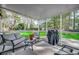 Relaxing screened porch overlooking the backyard at 4661 Tarpon Bay Rd., Myrtle Beach, SC 29579