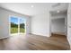 Bright bedroom with sliding glass doors leading to a patio at 49 Cape Point Dr., Conway, SC 29527