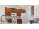 Modern kitchen with white appliances and ample counter space at 5719 Coquina Po Coquina Point Dr., North Myrtle Beach, SC 29582