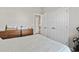 Bedroom with double bed, wooden dresser and double door closet at 508 Truitt Dr., Longs, SC 29568
