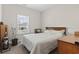 Comfortable bedroom with a double bed, wooden dresser and window at 508 Truitt Dr., Longs, SC 29568