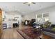 Open concept kitchen with white cabinets, stainless steel appliances, and an island at 508 Truitt Dr., Longs, SC 29568