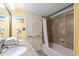 Clean bathroom with double vanity, tub, and shower at 5308 N Ocean Blvd. # 1406, Myrtle Beach, SC 29577