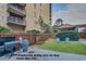 Complimentary grilling area with a grassy lawn and seating at 5308 N Ocean Blvd. # 1406, Myrtle Beach, SC 29577