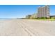 Expansive sandy beach with tire tracks and ocean view at 5308 N Ocean Blvd. # 1406, Myrtle Beach, SC 29577