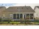 Fenced in backyard with view of the screened patio at 5314 Abbey Park Loop, Myrtle Beach, SC 29579