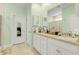 Light and airy bathroom featuring double vanity with granite counters and a glass enclosed shower at 5314 Abbey Park Loop, Myrtle Beach, SC 29579