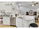 Clean and modern kitchen with stainless steel appliances, granite countertops, and a breakfast bar at 5314 Abbey Park Loop, Myrtle Beach, SC 29579
