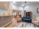Spacious living room featuring vaulted ceilings, skylights, and an open concept design at 5314 Abbey Park Loop, Myrtle Beach, SC 29579