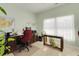 Well-lit home office with large desk, world map and United States map at 5314 Abbey Park Loop, Myrtle Beach, SC 29579
