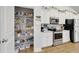 Walk-in pantry with organized shelving and plenty of storage space at 5314 Abbey Park Loop, Myrtle Beach, SC 29579