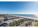Aerial view of coastal condo complex with oceanfront location and parking at 5523 North Ocean Blvd. # 1402, Myrtle Beach, SC 29577