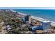 Aerial view of oceanfront building and beach at 5523 North Ocean Blvd. # 1402, Myrtle Beach, SC 29577