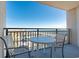 Oceanfront balcony with table and chairs, offering stunning views at 5523 North Ocean Blvd. # 1402, Myrtle Beach, SC 29577