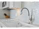 Modern kitchen sink and faucet with stylish backsplash at 5523 North Ocean Blvd. # 1402, Myrtle Beach, SC 29577