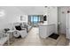 Kitchen with breakfast bar, ocean view, and living area at 5523 North Ocean Blvd. # 1402, Myrtle Beach, SC 29577