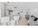 Modern white kitchen with breakfast bar and ocean view at 5523 North Ocean Blvd. # 1402, Myrtle Beach, SC 29577