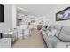 Living room with gray sofa and ocean view at 5523 North Ocean Blvd. # 1402, Myrtle Beach, SC 29577