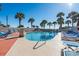 Inviting community pool with surrounding lounge chairs at 5523 North Ocean Blvd. # 1402, Myrtle Beach, SC 29577